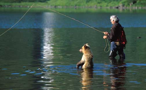 Charlie fishing with Biscuit